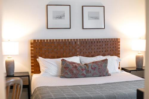 a bedroom with a large bed with two lamps at Orion A 3BR Heated Pool with Desk and Laundry in Port Isabel