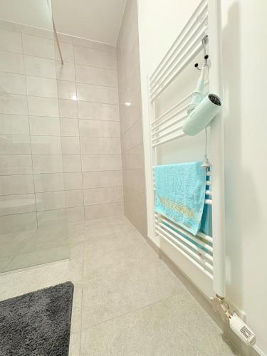a bathroom with a shower and a sink at Sky apartment in Sarajevo