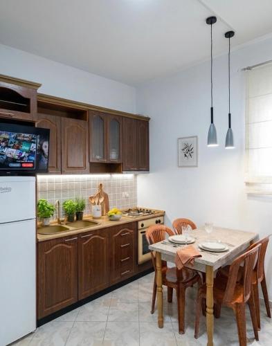 Kuchyň nebo kuchyňský kout v ubytování E Apartment