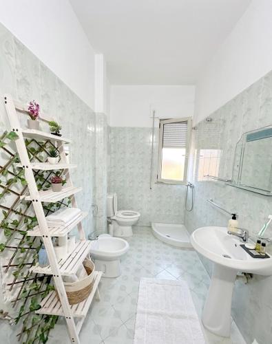 Koupelna v ubytování E Apartment