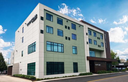 a rendering of the front of a building at Courtyard by Marriott Eugene Downtown in Eugene
