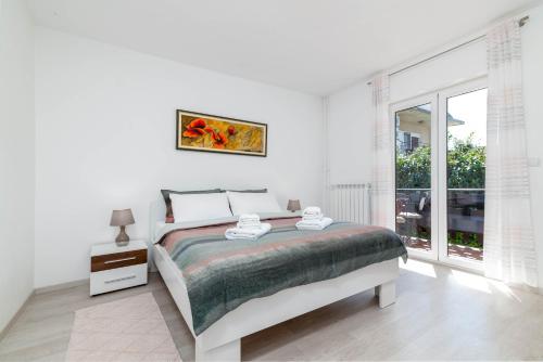 Apartments with parking space Umag - 21460