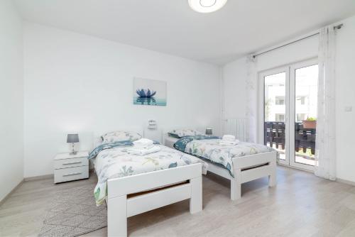 Apartments with parking space Umag - 21460