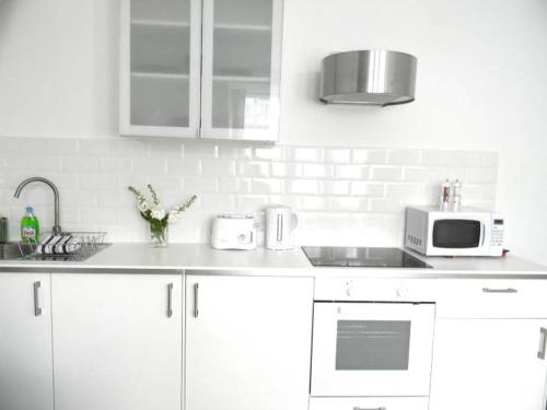 Una cocina o cocineta en Boutique Accommodation