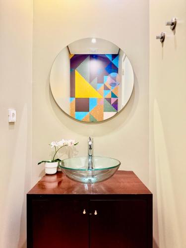 a bathroom with a sink and a mirror at Lisboa Arroios Apartment in Lisbon