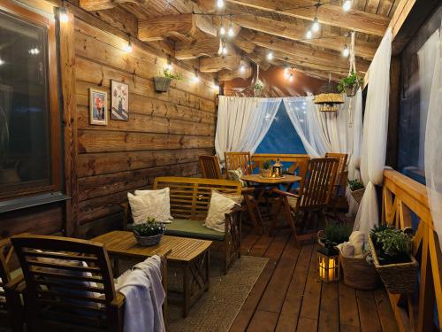 a restaurant with a table and chairs in a room at Józwówka Swornegacie in Swornegacie