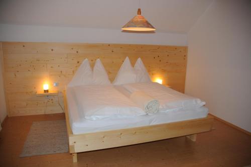 Postelja oz. postelje v sobi nastanitve Gästehaus Brugger