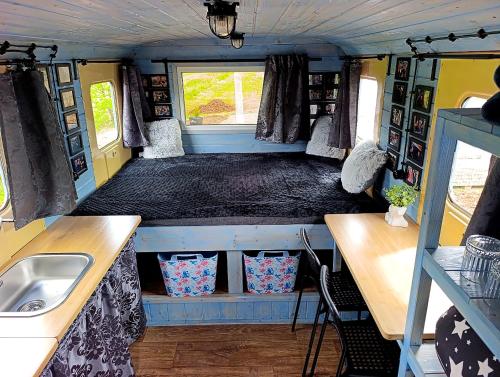 a view of the inside of a camper van with a sink at Andělka maringotka in Humpolec