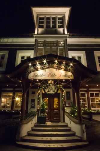 an entrance to a building with christmas lights at Lahntalhotel Feudingen in Bad Laasphe