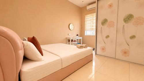 a small bedroom with a bed and a shower at Casa Le Seabreeze 4BR with Projector in Kuah