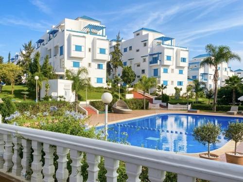 a view of the apartment buildings from the balcony at Luxury apartment Smir Park - Marina Smir in Marina Smir
