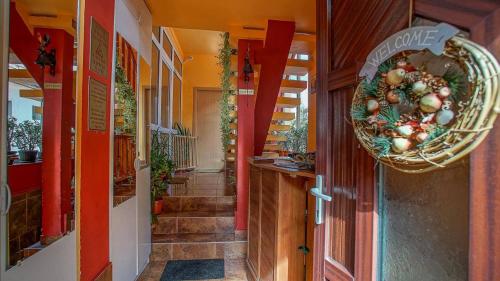 a hallway of a store with a basket of fruit at Pensiunea Hanna in Braşov