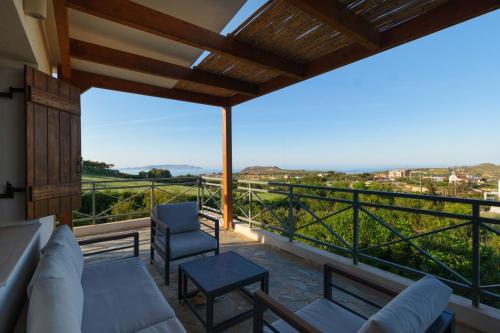 a view from the balcony of a house at Dia View Retreat in Elaía
