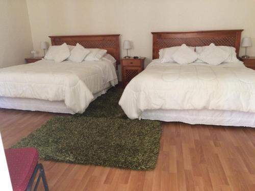 Cama o camas de una habitación en Hotel San Fernando