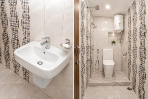 a bathroom with a sink and a toilet at Hotel Red Rose in Darjeeling