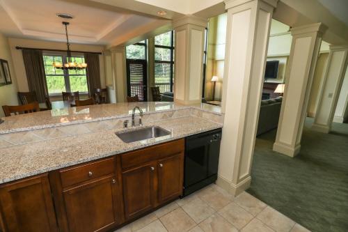 a kitchen with a sink and a counter at Kaatskill Mountain Club & Condos by Vail Resorts in Hunter