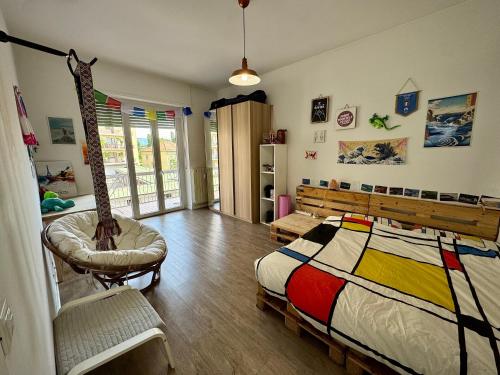 a bedroom with a giraffe themed bed and a chair at Dora Flow in Banchette