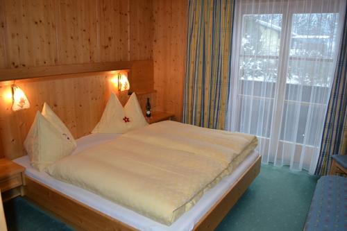 Ένα ή περισσότερα κρεβάτια σε δωμάτιο στο Haus Thurner