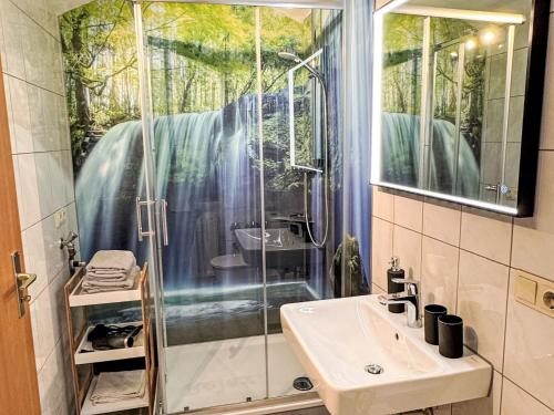 a bathroom with a shower and a sink at Apartment Apartment Wuff by Interhome in Altendorf