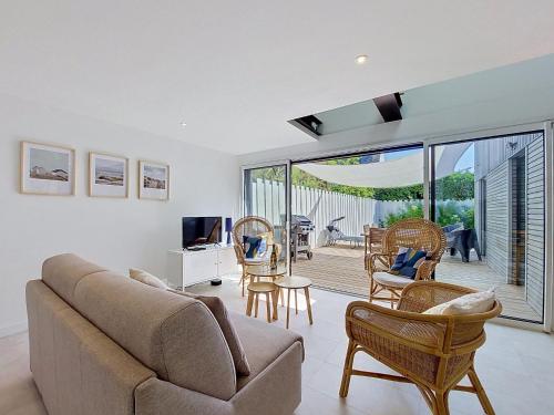 a living room with a couch and chairs at Holiday Home Ker Bernic by Interhome in Piriac-sur-Mer
