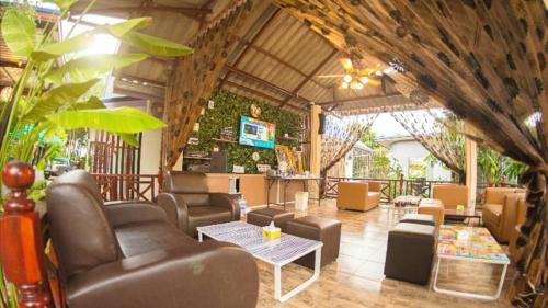 TV a/nebo společenská místnost v ubytování Nai C Resort