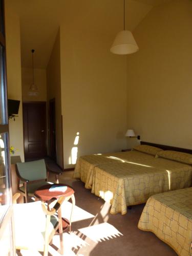 Postel nebo postele na pokoji v ubytování Hotel Finca Los Venancios