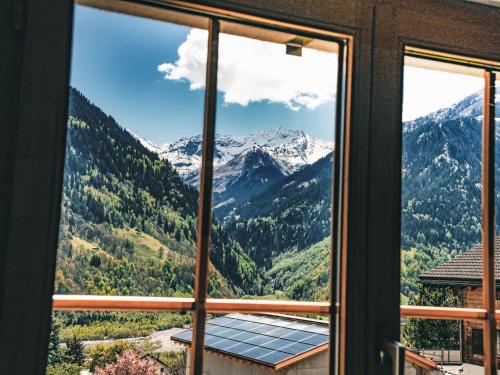 a view from a window of a mountain at Apartment Casa Foppa by Interhome in Rabius