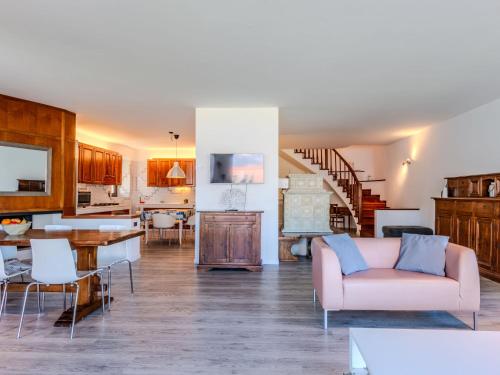 a living room with a couch and a table at Villa Manuela by Interhome in Brenzone sul Garda