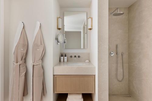 a bathroom with a sink and a shower at White Elephant Aspen in Aspen