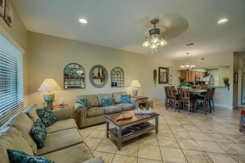 a living room with a couch and a table at CW C207 River Zen in New Braunfels