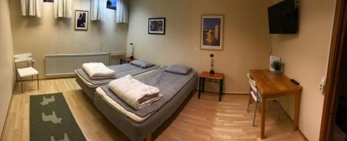 Säng eller sängar i ett rum på Vasaloppsmålet - Hostel Mora - Målkullans Vandrarhem