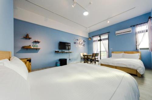 Cama o camas de una habitación en Sea breeze Inn