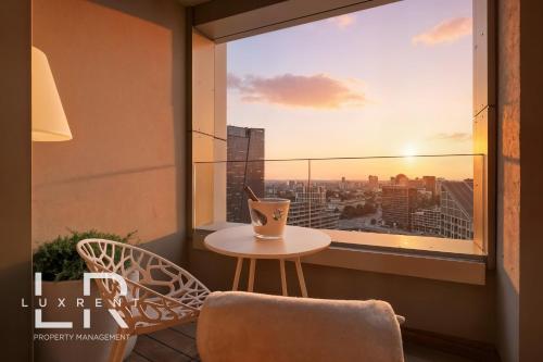 Foto SKYPARK Elite Suite, City View ,FREE PARKING 1