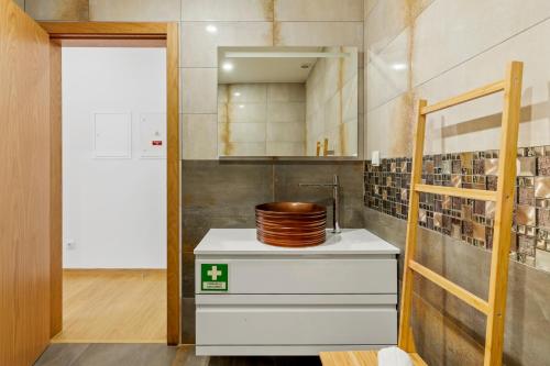 a bathroom with a sink with a bowl on a counter at JB RiaMar l by Meditrust in Alvor