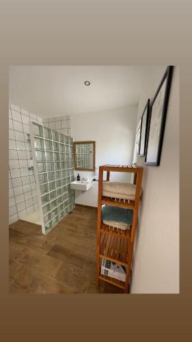 a small room with a staircase in a room with at Casa La Isla in Sagres