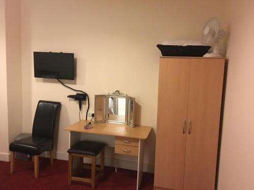 TV a/nebo společenská místnost v ubytování ML Lodge