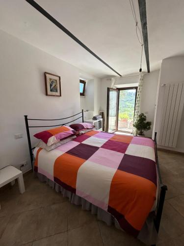 a bedroom with a large bed in a room at Da Lucia in Francavilla al Mare