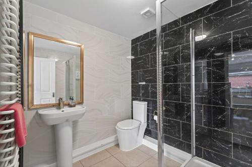 a bathroom with a sink and a toilet and a shower at 2 Bed in Alkham oc-p34785 in Swingfield