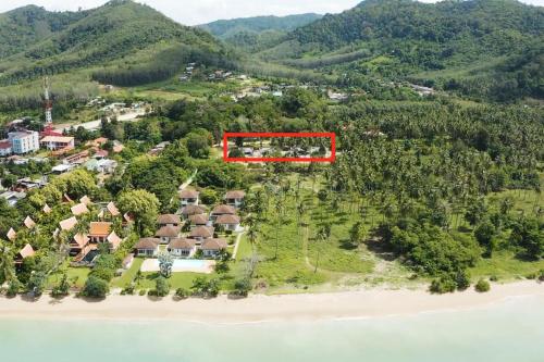 an aerial view of a house on a beach at Manao Pool Villa 6 - 5 Mins Walk To The Beach in Ko Lanta