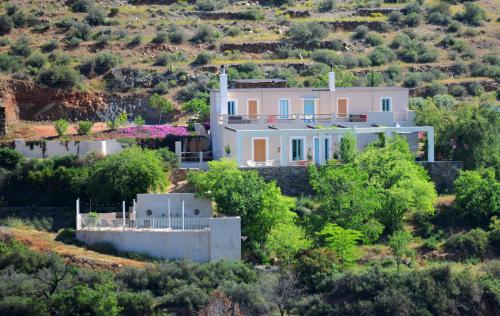 a house on a hill with trees and bushes at Casa Mimi B&B Adults Only in Gérgal
