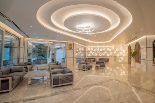 a lobby of a building with a large ceiling at Kalithea Horizon Blu - Adults Only in Kallithea Rhodes