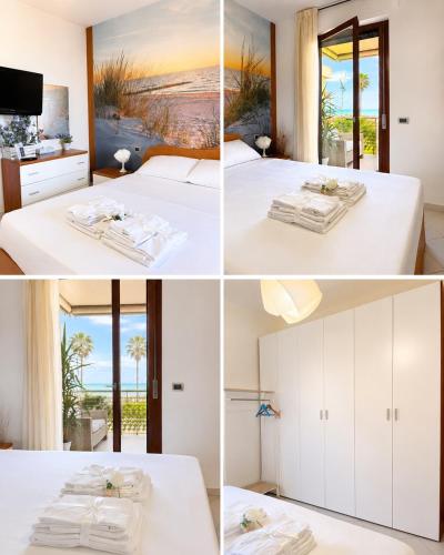 a hotel room with a view of the ocean at Sea Colors Apartment in Montesilvano
