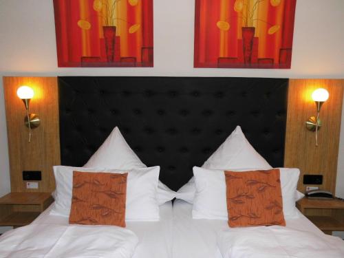 Katil atau katil-katil dalam bilik di Aparthotel Guzulka & Restaurant