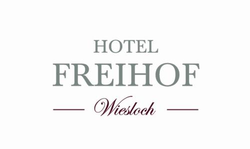 a sign that reads hotel firefighter mallet at Hotel Freihof in Wiesloch