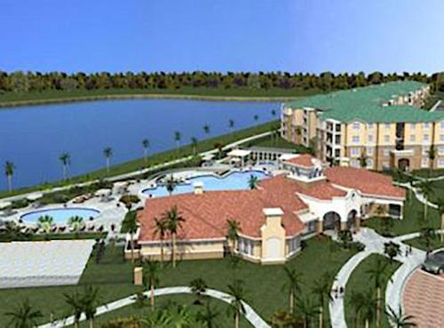 an aerial view of a resort with a swimming pool at Vista Cay Inn in Orlando