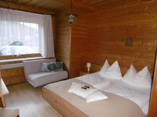 Tempat tidur dalam kamar di Appartements Oberhof