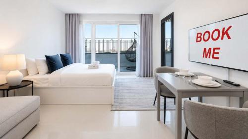 Free housekeeping visits during your stay - StayShort - Studio in Damac Hills that Sleeps 3 with Terrace!