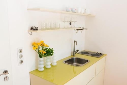 Η κουζίνα ή μικρή κουζίνα στο Design Apartments in Park