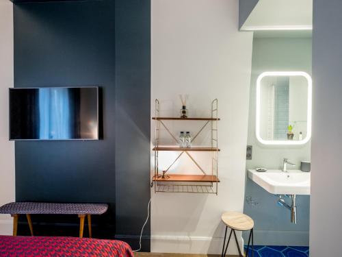 O baie la 1er Etage SoPi-Montmartre