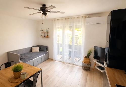 "COSY" Appartement confort de 50m2 à 150m de la Mer et du Centre ville, parking gratuit